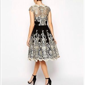 Black and gold lace dress